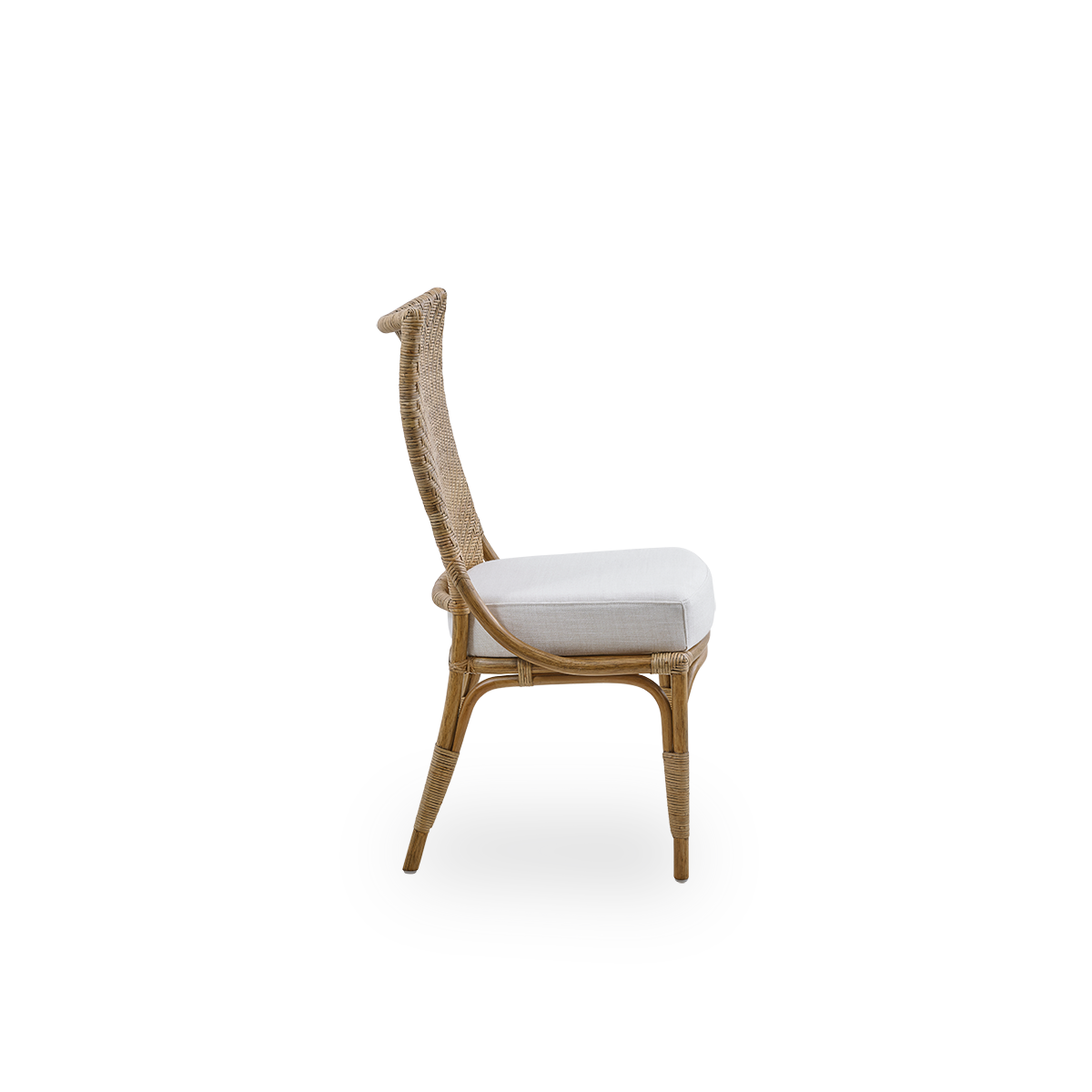 Plain side view of Melody dining chair in Antique rattan color with high fully woven rattan backrest and upholstery seat.