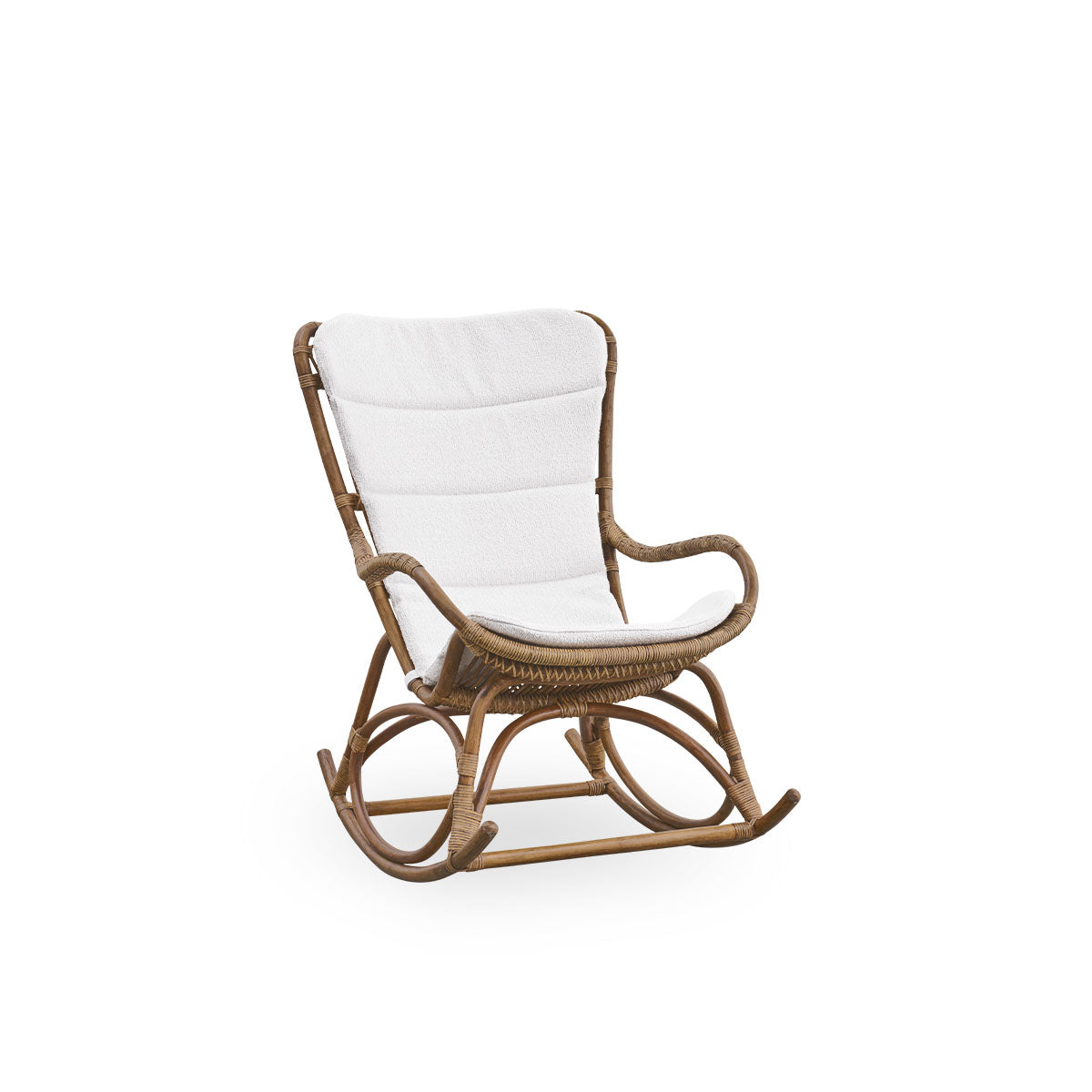 Side view of Monet rocking chair with high backrest and armrests presented in Antique brown color. Handcrafted from high-quality Indonesian rattan.