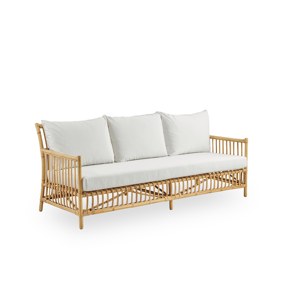 Side view of Caroline 3-seater wicker sofa, simple and elegant Danish design. Handcrafted from Indonesian rattan with detailed woven accents for a cozy, calming presence.