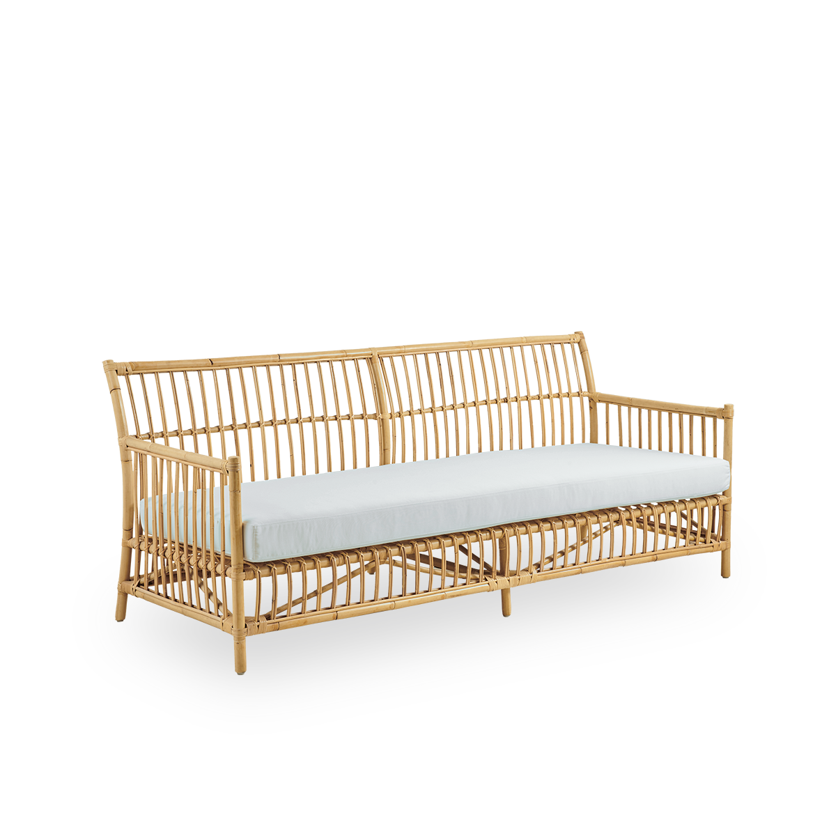 Side view of Caroline 3-seater wicker sofa, simple and elegant Danish design. Handcrafted from Indonesian rattan with detailed woven accents for a cozy, calming presence.