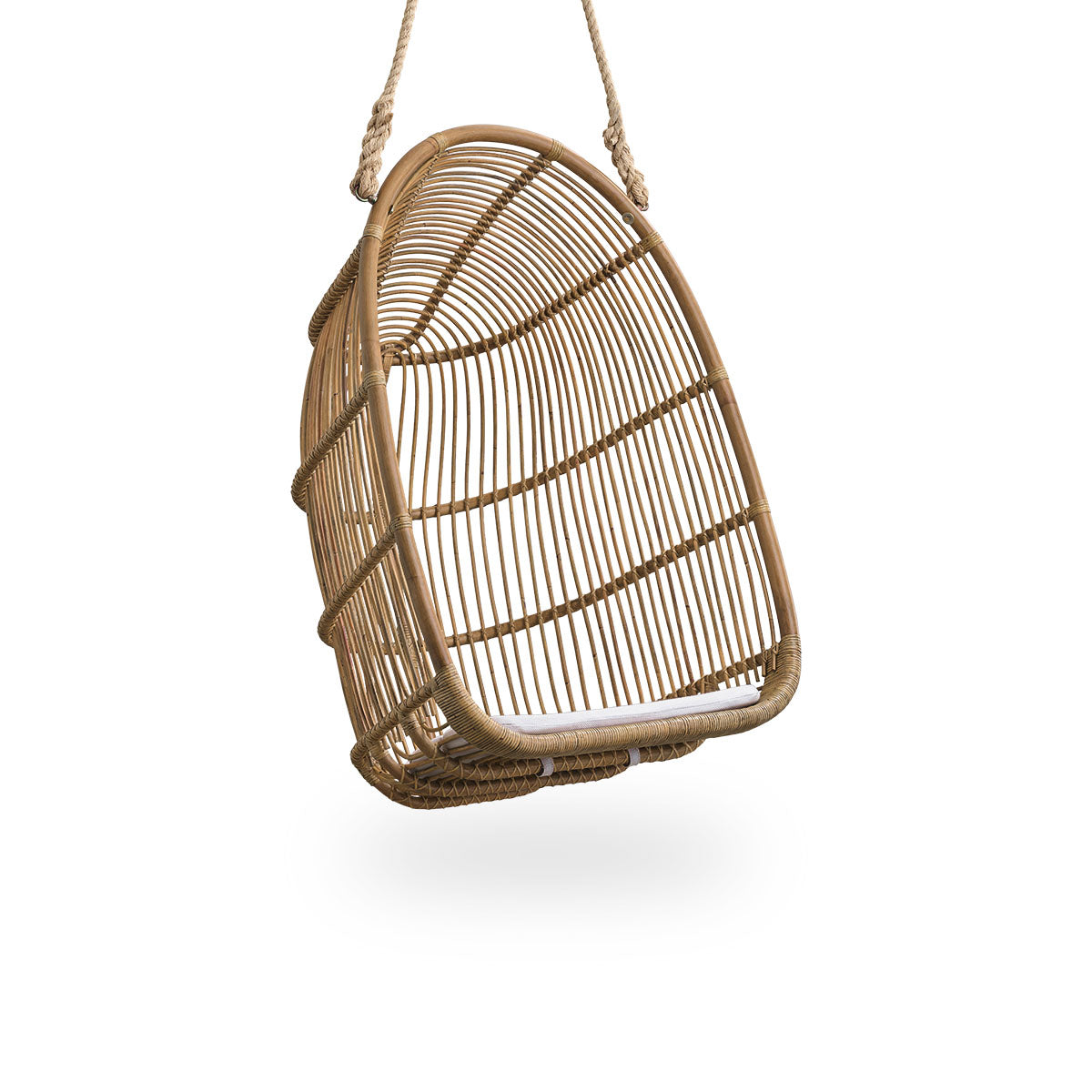 Side view of Renoir hanging chair in Antique brown color handcrafted in high quality rattan. Soft, embracing shape suspended with strong rope.