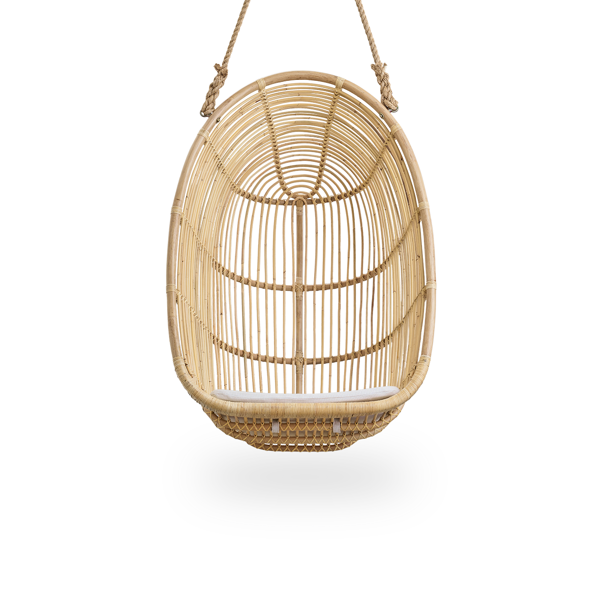 Front view of the Renoir hanging chair in natural color handcrafted in high-quality rattan.
Soft, embracing shape suspended with strong rope.