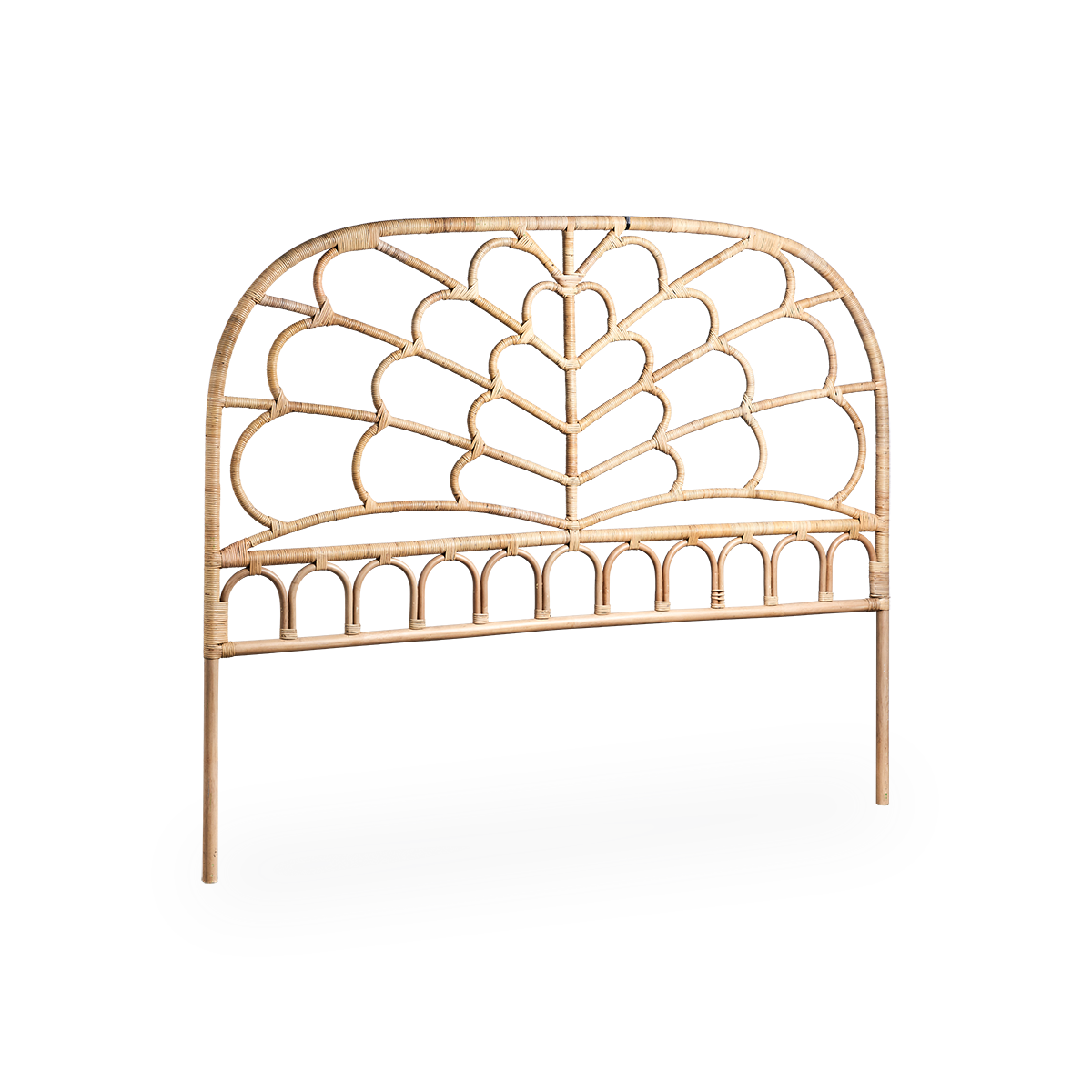 Side view of the Celia headboard handcrafted from high-quality Indonesian rattan. Finished in an natural color with detailed weavings inspired by butterfly wings.