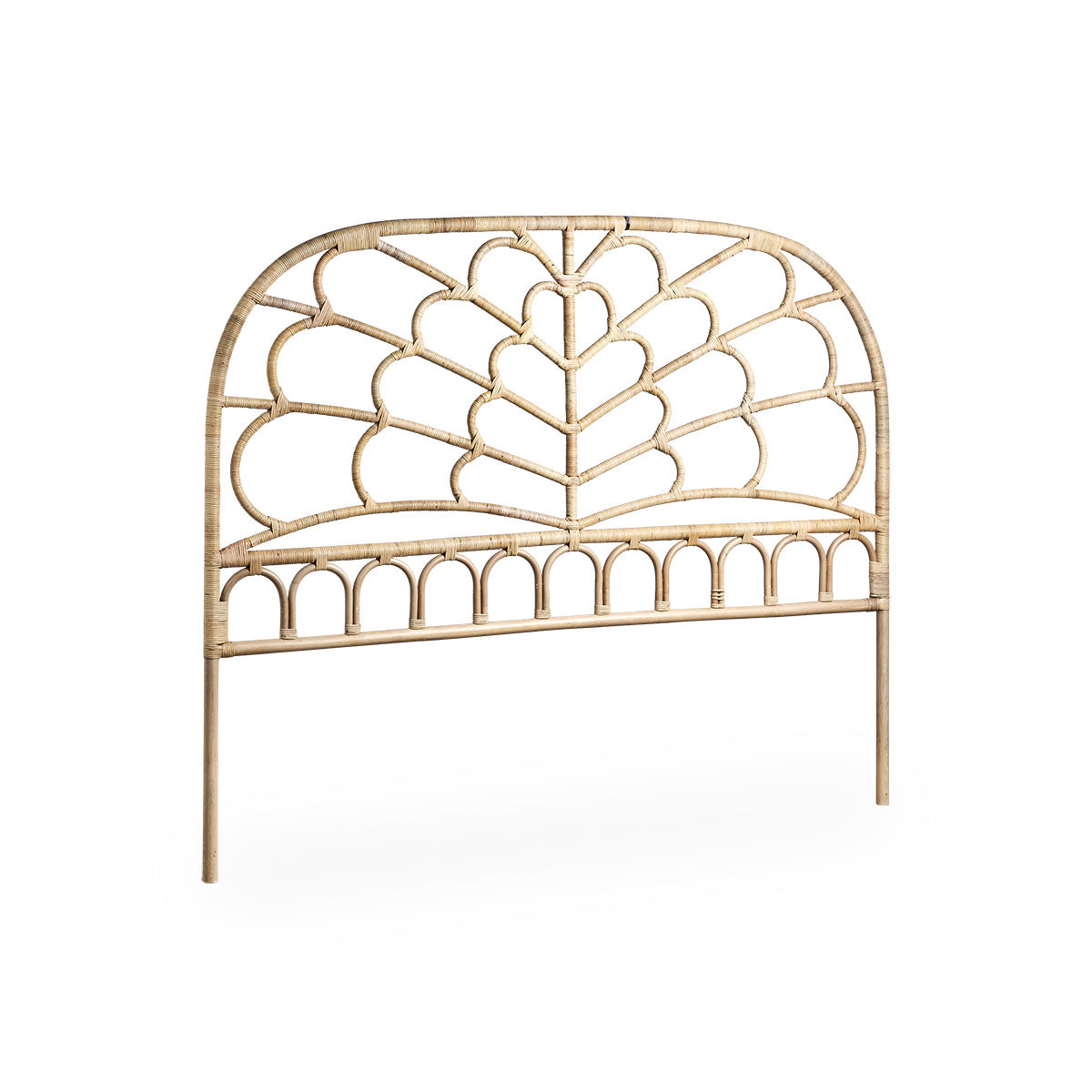 Side view of the Celia headboard handcrafted from high-quality Indonesian rattan. Finished in an natural color with detailed weavings inspired by butterfly wings.