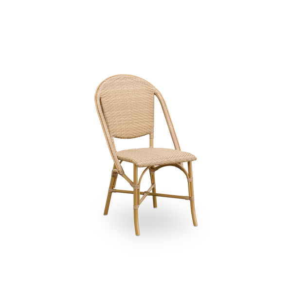 Side view of Sofie outdoor dining chair inspired by French café style. Aluminium frame in Almond color with fully woven seat- and backrest handcrafted in ArtFibre in natural color. Stackable outdoor bistro chair.