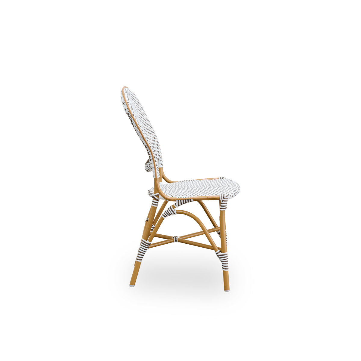 Plain side view of Isabell outdoor dining chair. Almond colored aluminium frame with seat and backrest made in white ArtFibre with brown dots. Inspired by 1950s bistro design.