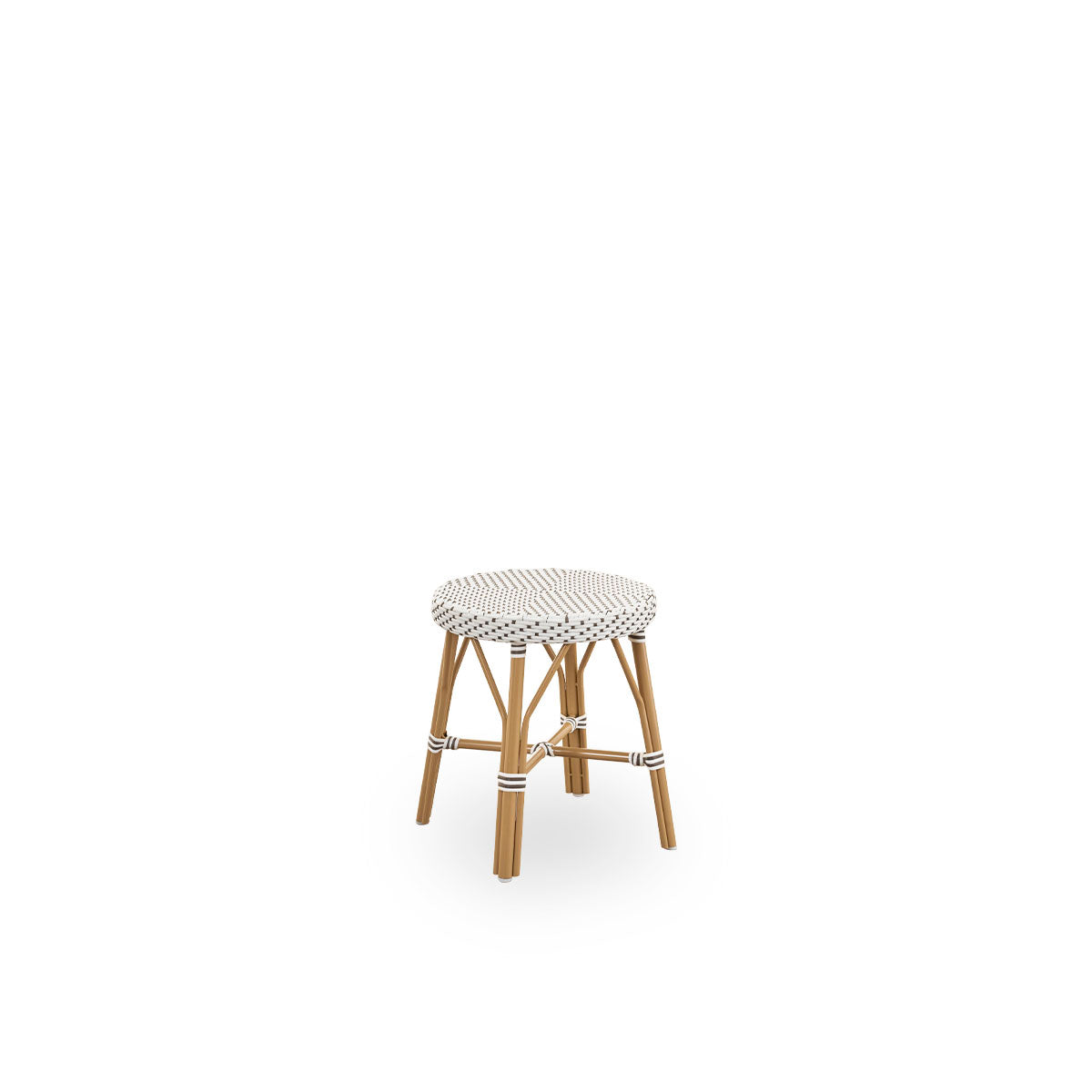 Side view of Simone outdoor stool height 52 cm. Aluminium frame in Almond color with footrest, with fully woven round seat handcrafted in ArtFibre in white with brown dots pattern. Stackable stool.