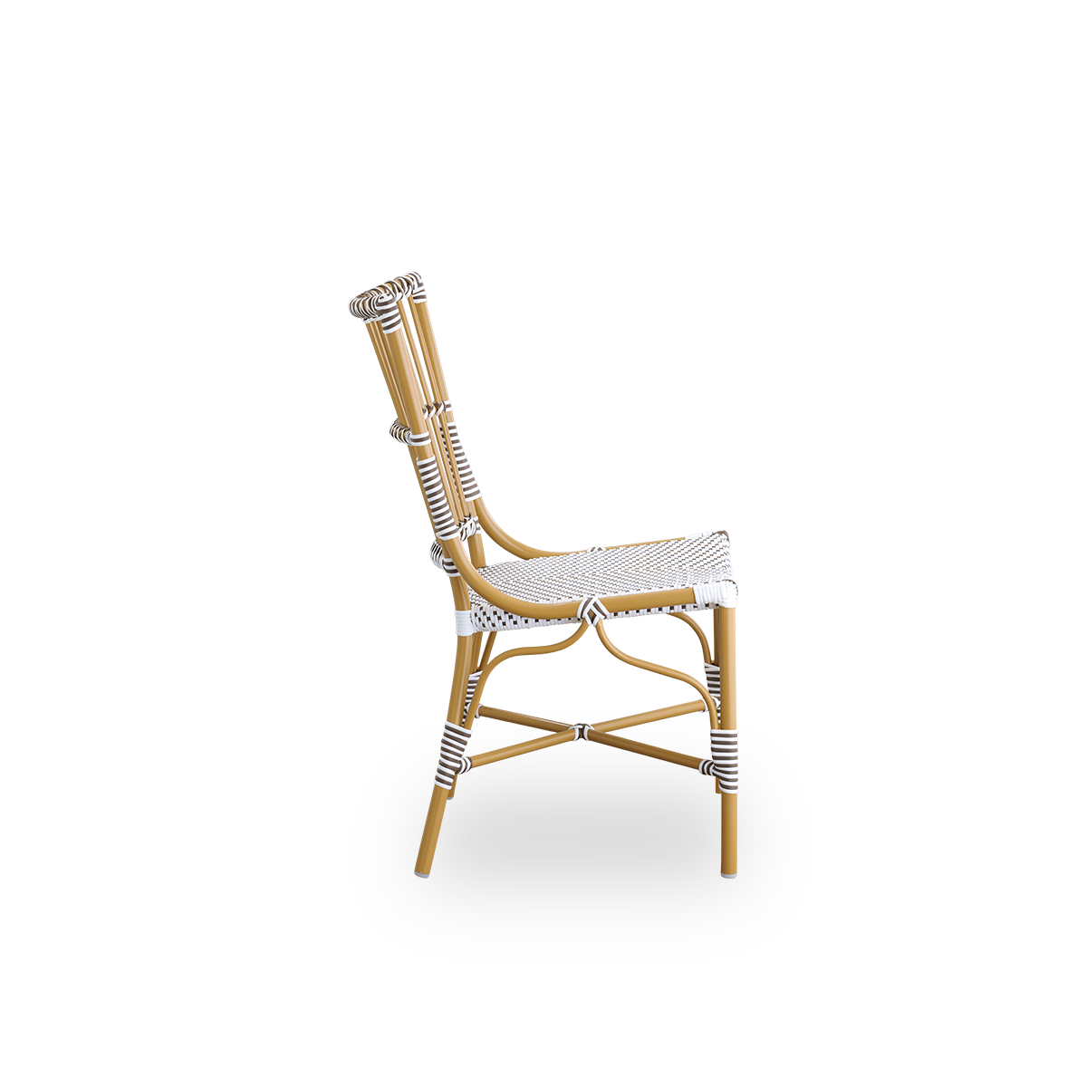 Plain side view of Monique outdoor dining chair. Aluminium frame in almond color with seat woven with ArtFibre in white with brown dots. Inspired by 1950s bistro design.