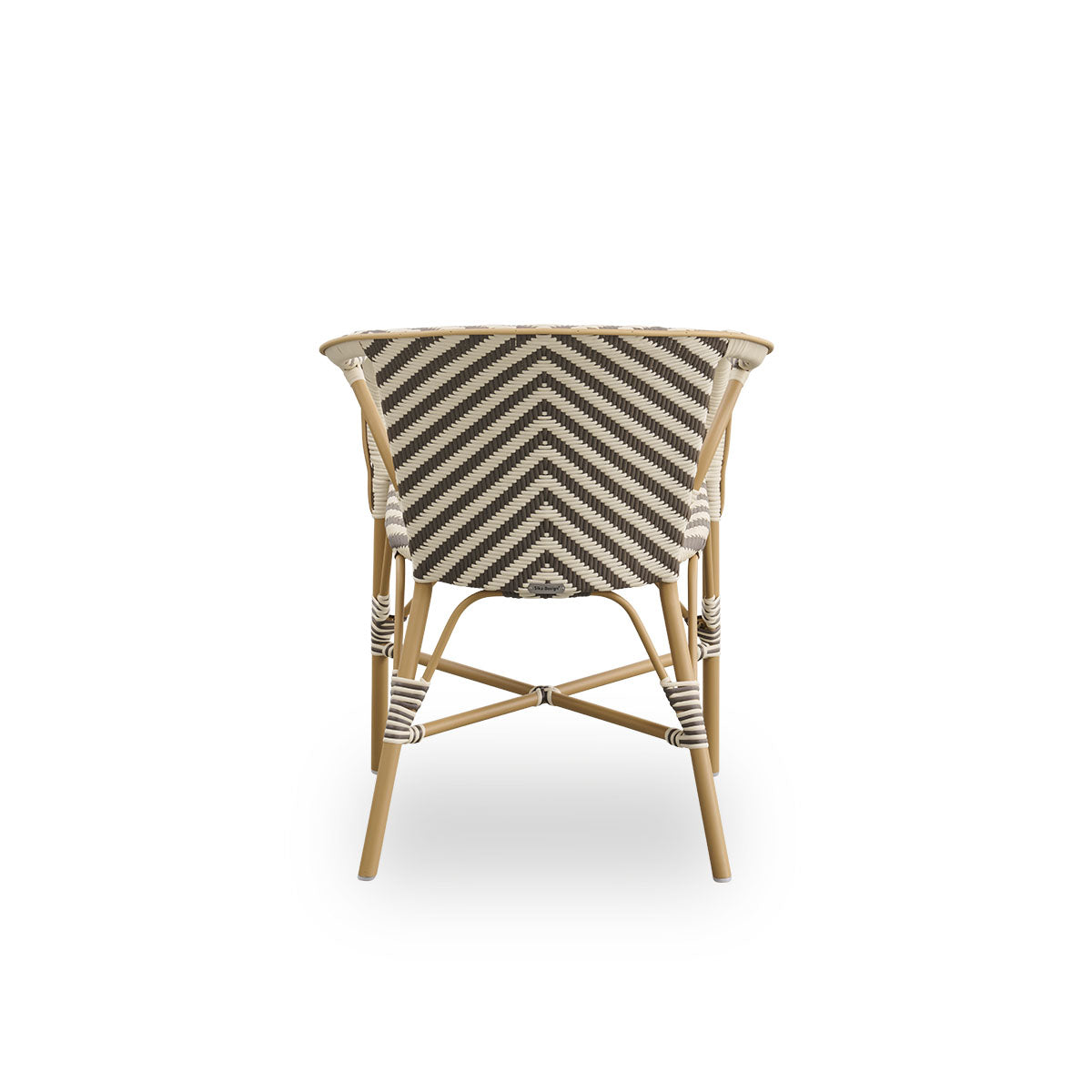 Plain back view of Madeleine outdoor dining armchair. Aluminium frame in almond color with seat and backrest woven with ArtFibre in ivory and brown herringbone pattern.