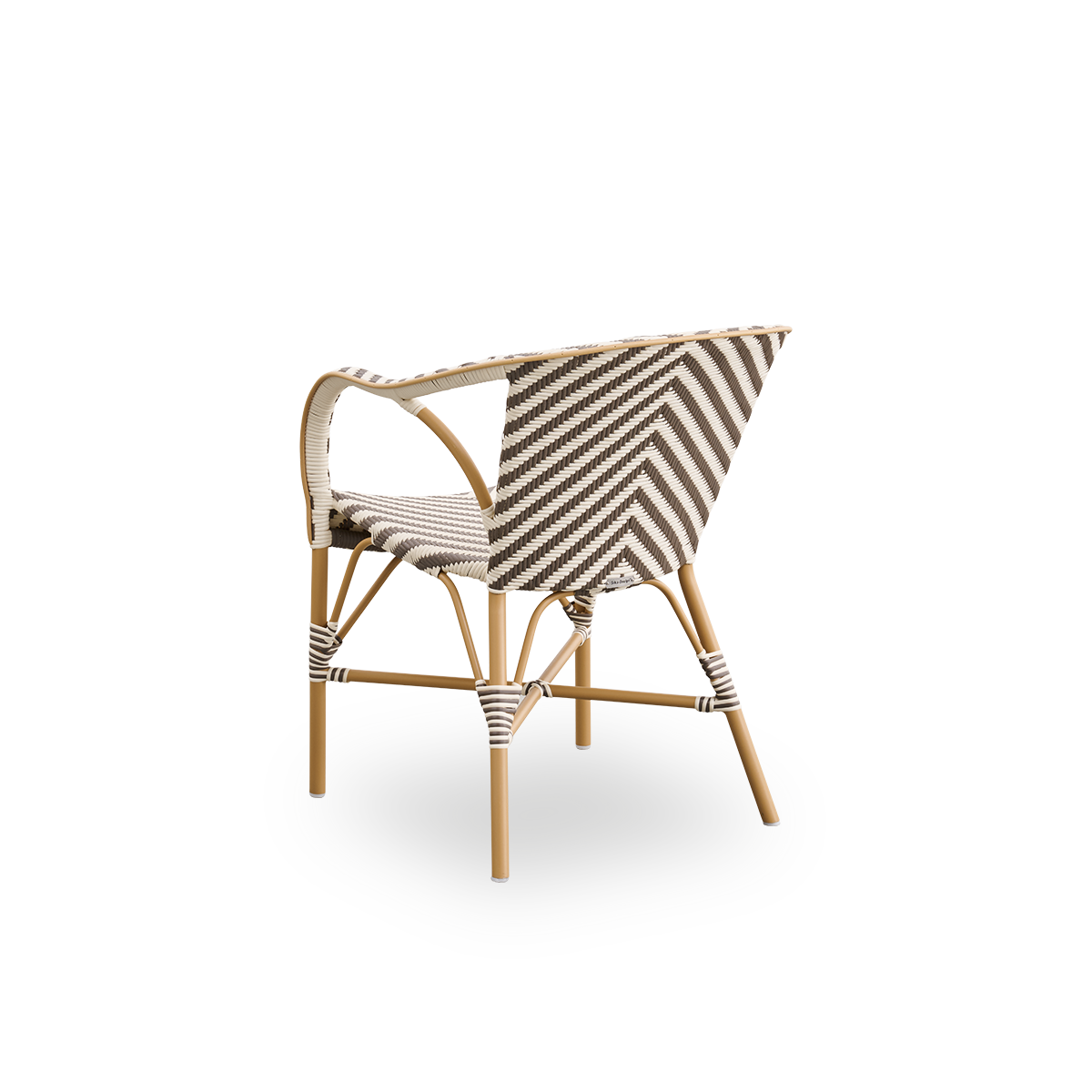Back side view of the Madeleine outdoor dining armchair.
Aluminum frame in almond color with seat and backrest woven with ArtFibre in an ivory and brown herringbone pattern.