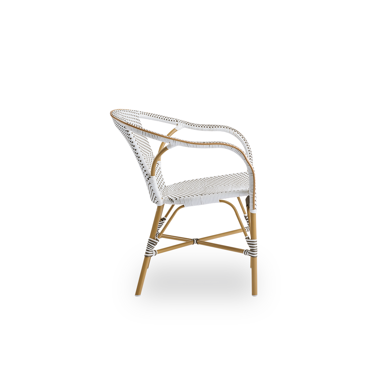 Plain side view of Madeleine outdoor dining armchair. Aluminium frame in almond color with seat and backrest woven with ArtFibre in brown with white dots.