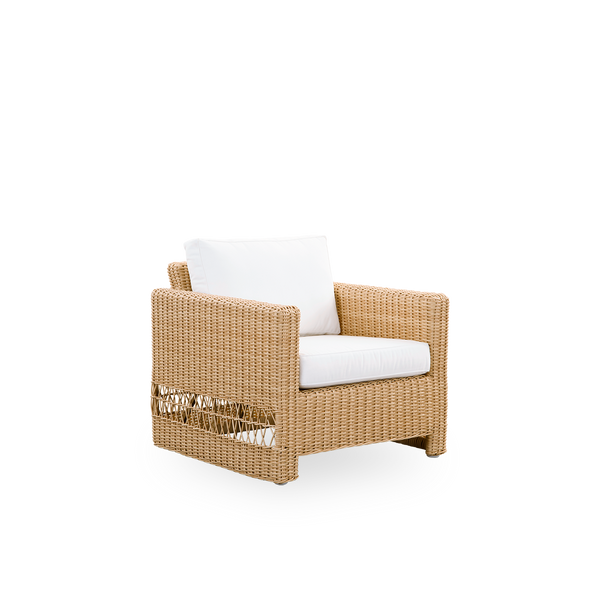 Side view of Carrie Exterior Lounge chair in the color Natural. Squared robust lounge chair made with aluminium frame fully woven with ArtFibre.
