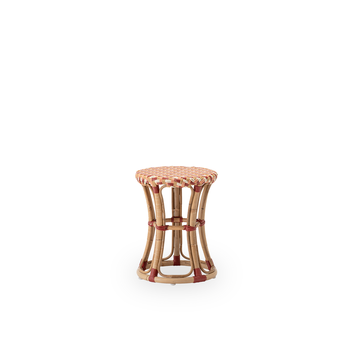 Side view of the Chloe stool on a skin-on rattan frame, in a zigzag weave in ivory, honey, coral and burgundy red on a skin-on rattan frame. Designed by Rasmus Andreasen, fourth generation of the Sika-Design family, as a decorative and multipurpose piece.