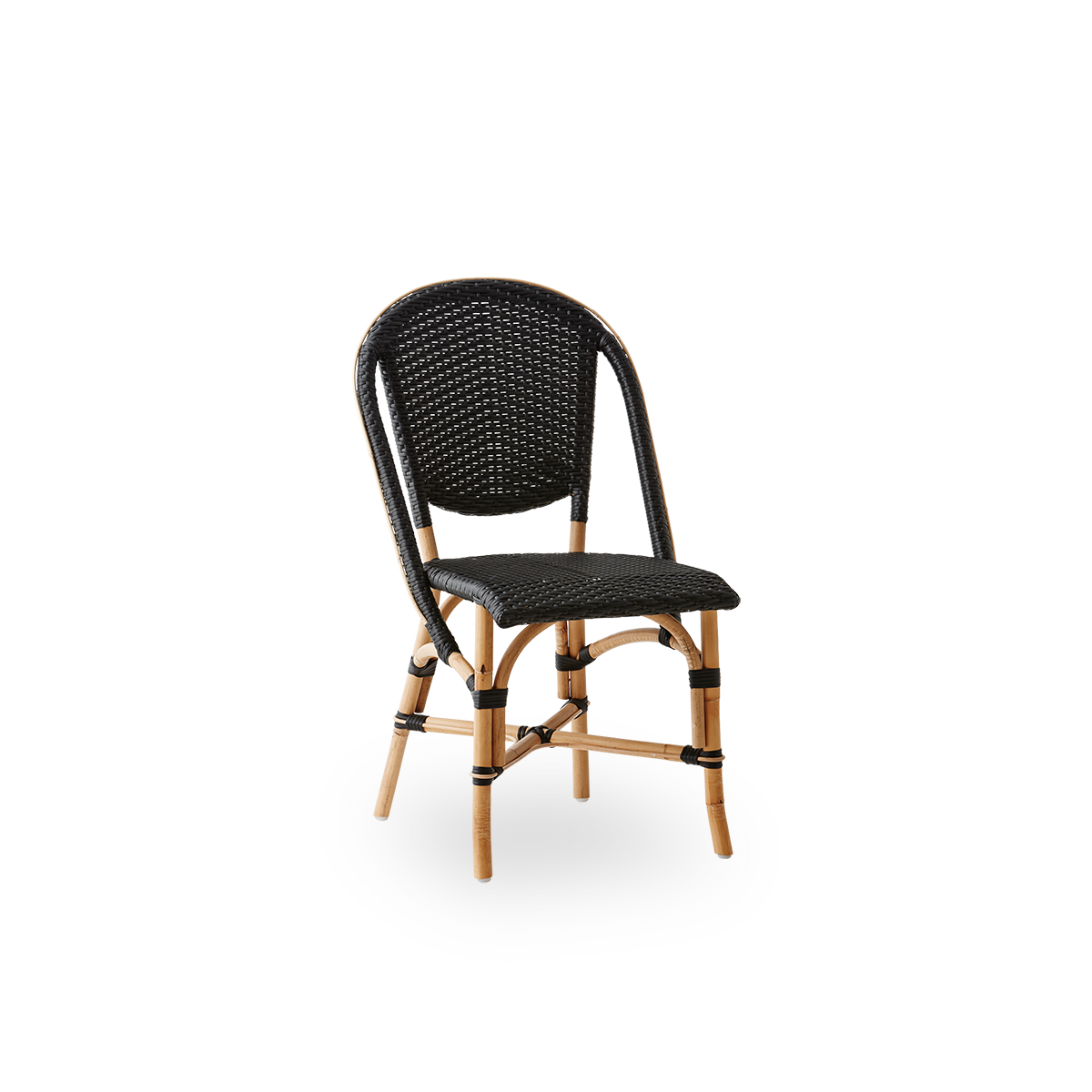 Side view of Sofie rattan dining chair inspired by French café style. Rattan frame with fully woven seat- and backrest handcrafted in ArtFibre in black color. Stackable rattan bistro chair.