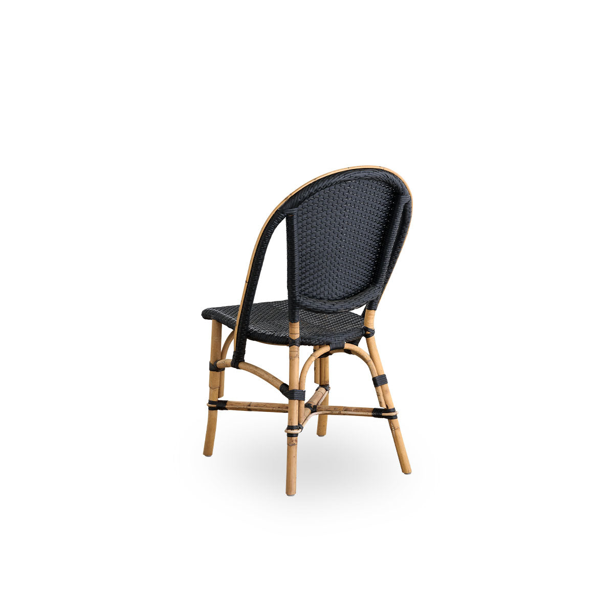 Back side view of the Sofie rattan dining chair inspired by French café style.
Rattan frame with fully woven seat and backrest handcrafted in ArtFibre in black color. Stackable rattan bistro chair.