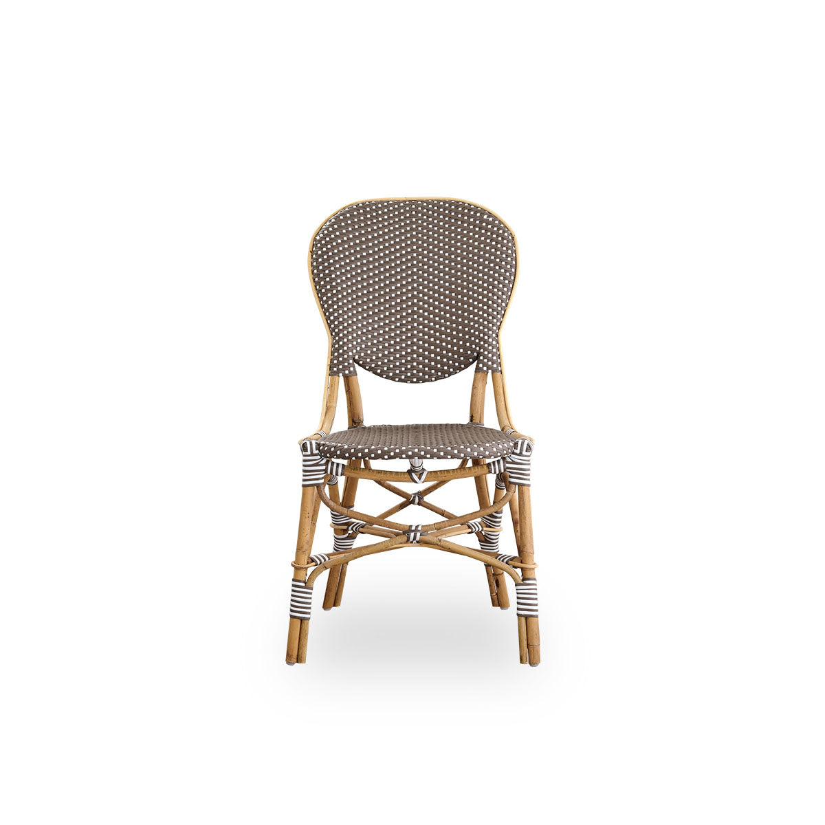 Front view of the Isabell dining chair.
Rattan frame with seat and backrest made in brown ArtFibre with white dots. Inspired by 1950s bistro design.