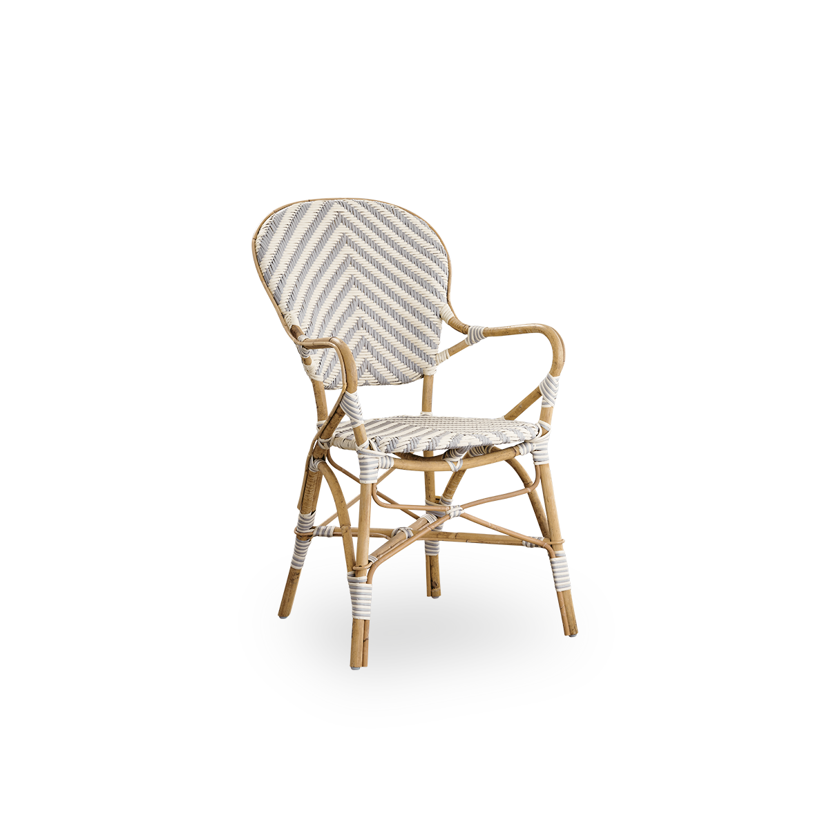 Side view of Isabell dining chair with armrest. Rattan frame with seat and backrest made in ArtFibre in ivory and grey herringbone pattern. Inspired by 1950s bistro design.