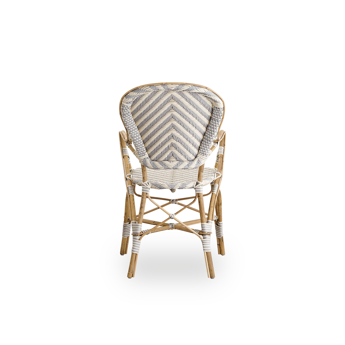 Plain back view of Isabell dining chair with armrest. Rattan frame with seat and backrest made in ArtFibre in ivory and grey herringbone pattern. Inspired by 1950s bistro design.