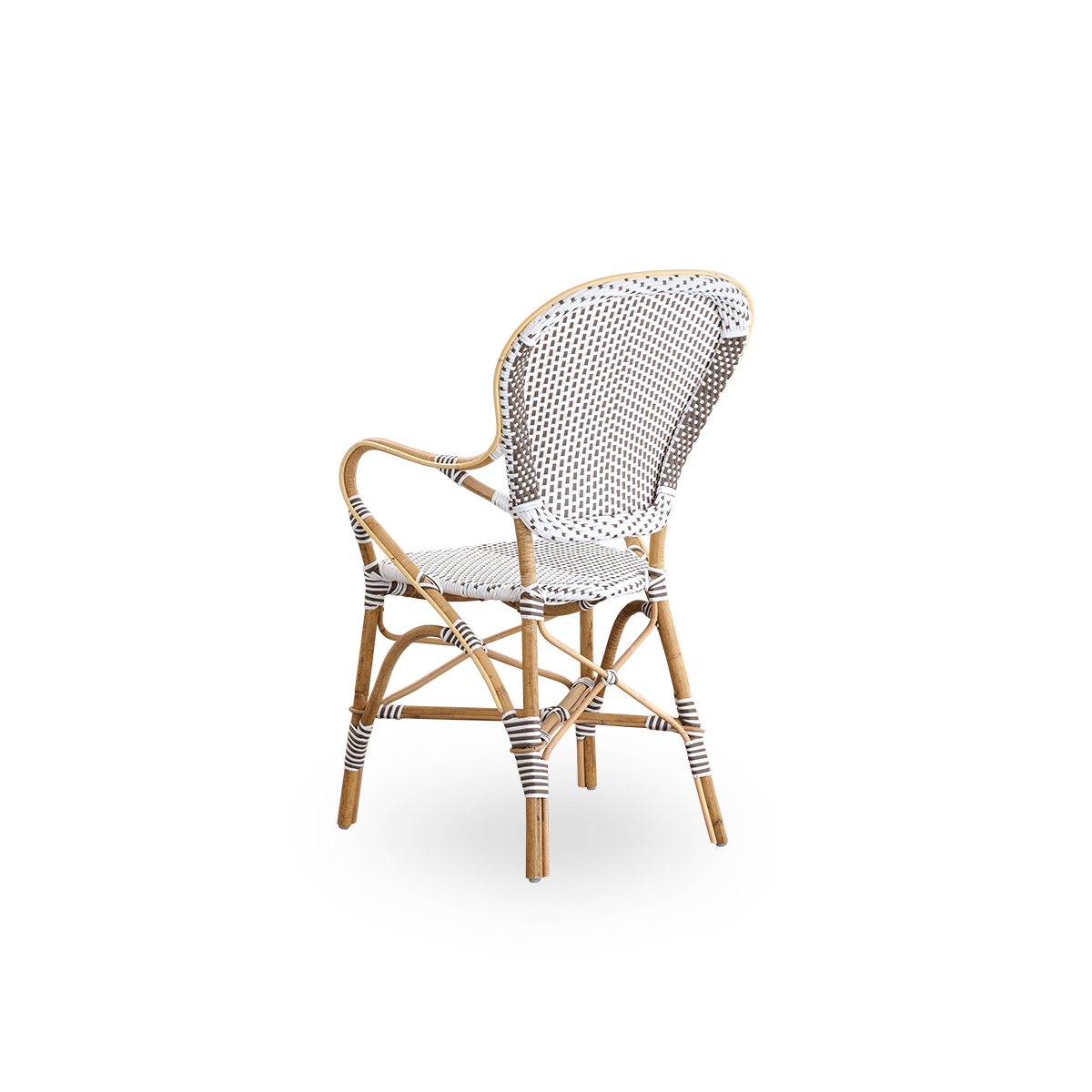 Back side view of the Isabell dining chair with armrests.
Rattan frame with seat and backrest made in white ArtFibre with brown dots. Inspired by 1950s bistro design.