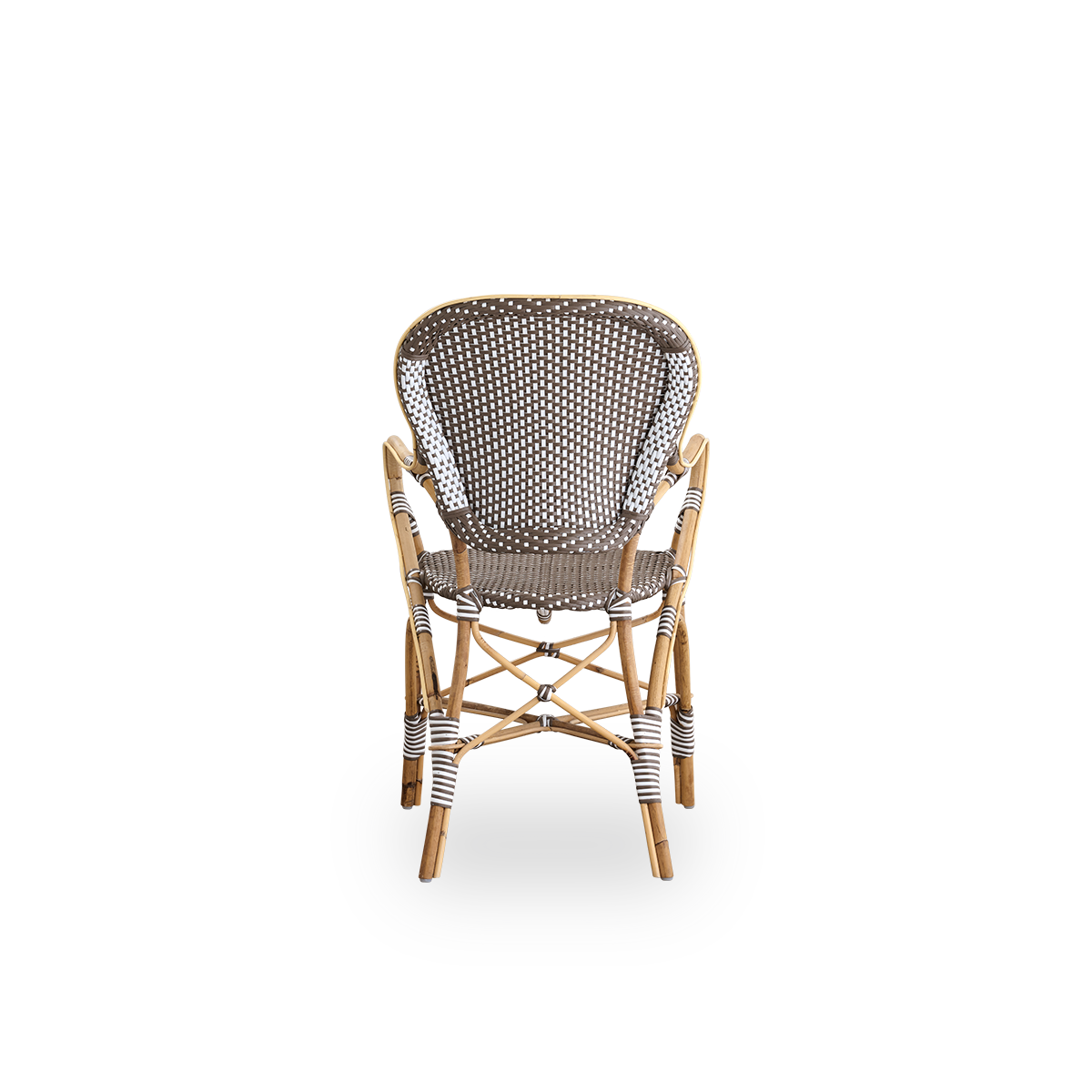 Plain back view of Isabell dining chair with armrest. Rattan frame with seat and backrest made in brown ArtFibre with white dots. Inspired by 1950s bistro design.