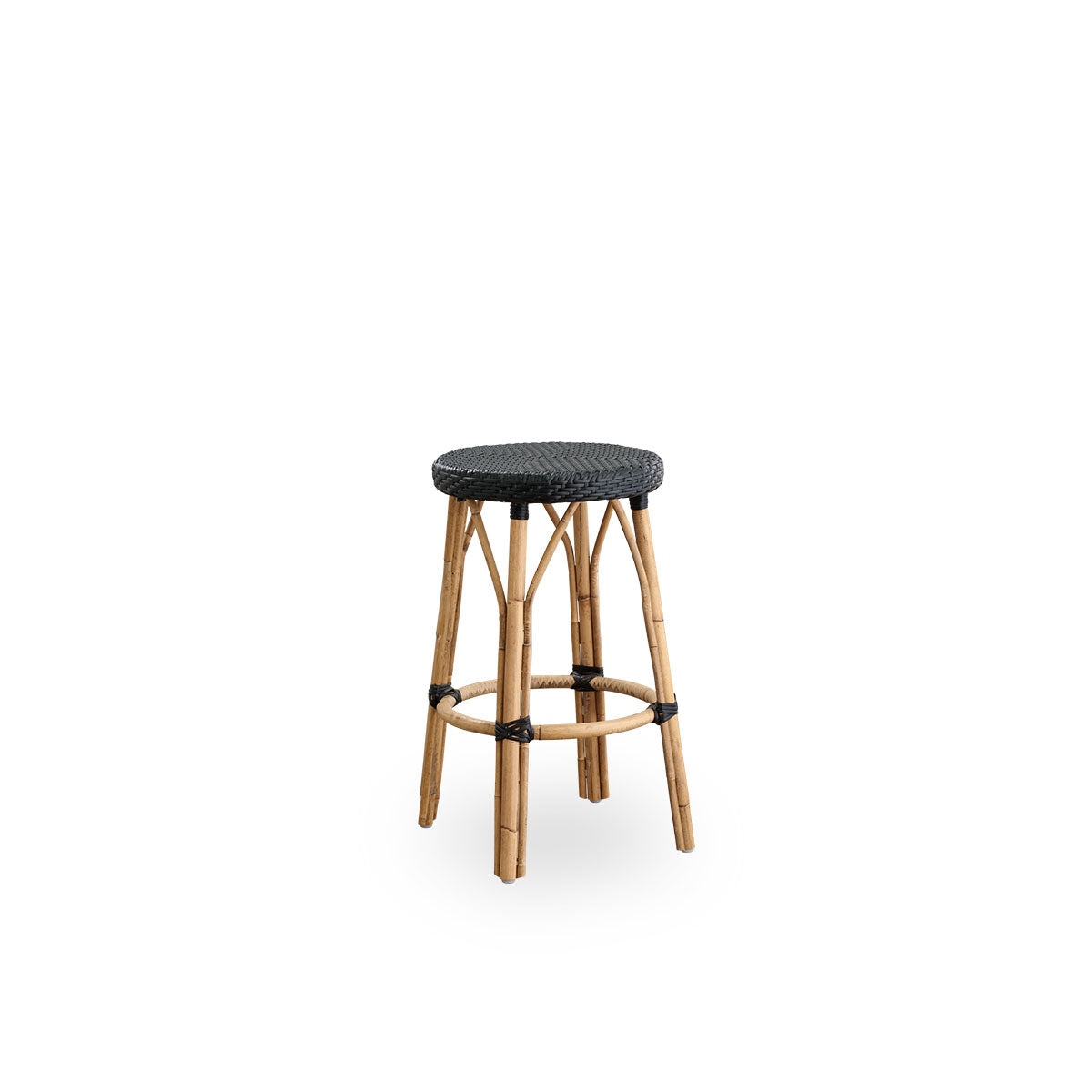 Side view of Simone counterstool height 68 cm. Rattan frame with footrest, with fully woven round seat handcrafted in ArtFibre in black color. Stackable counterstool.
