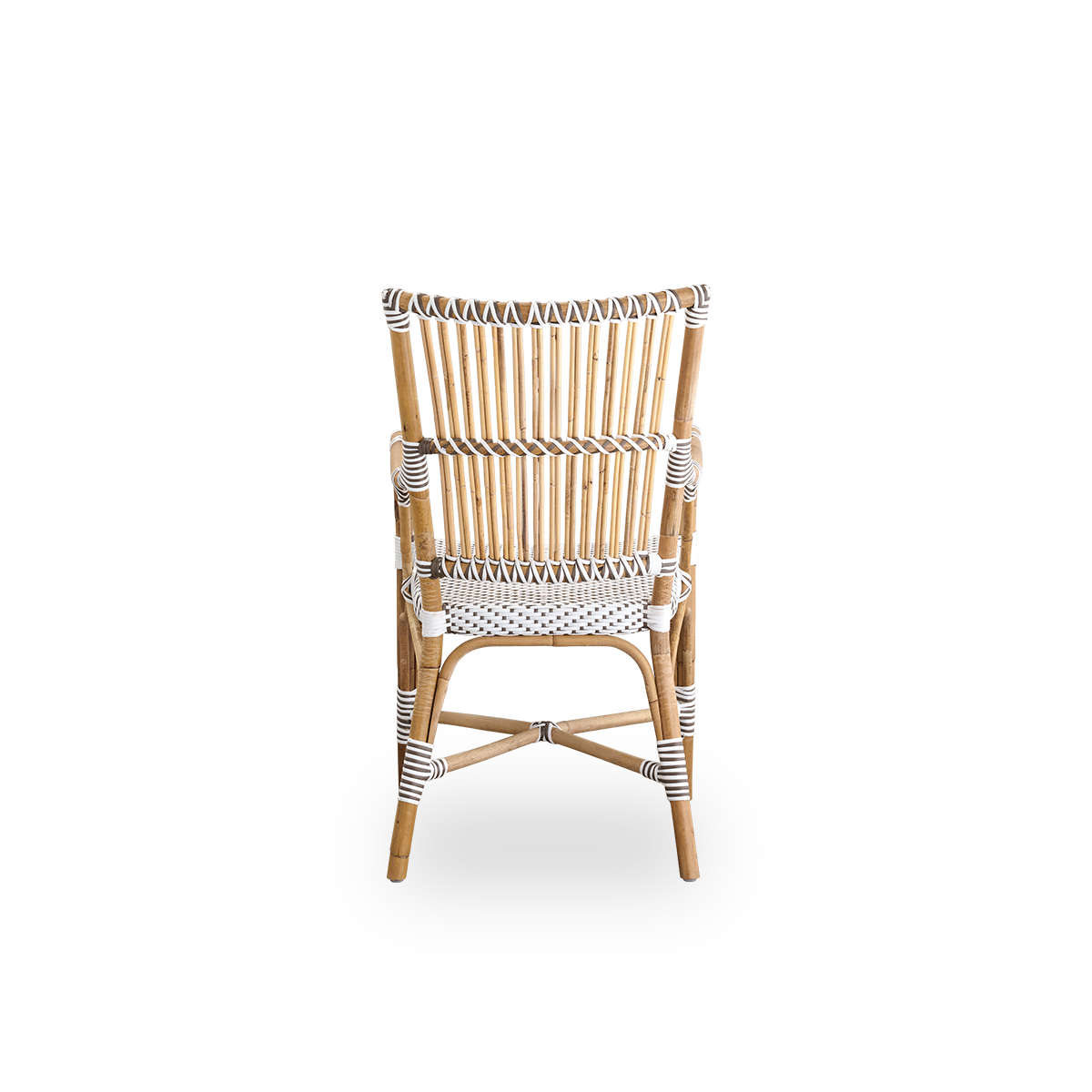 Plain back view of Monique dining armchair. Rattan frame with seat woven with ArtFibre in white with brown dots. Inspired by 1950s bistro design.