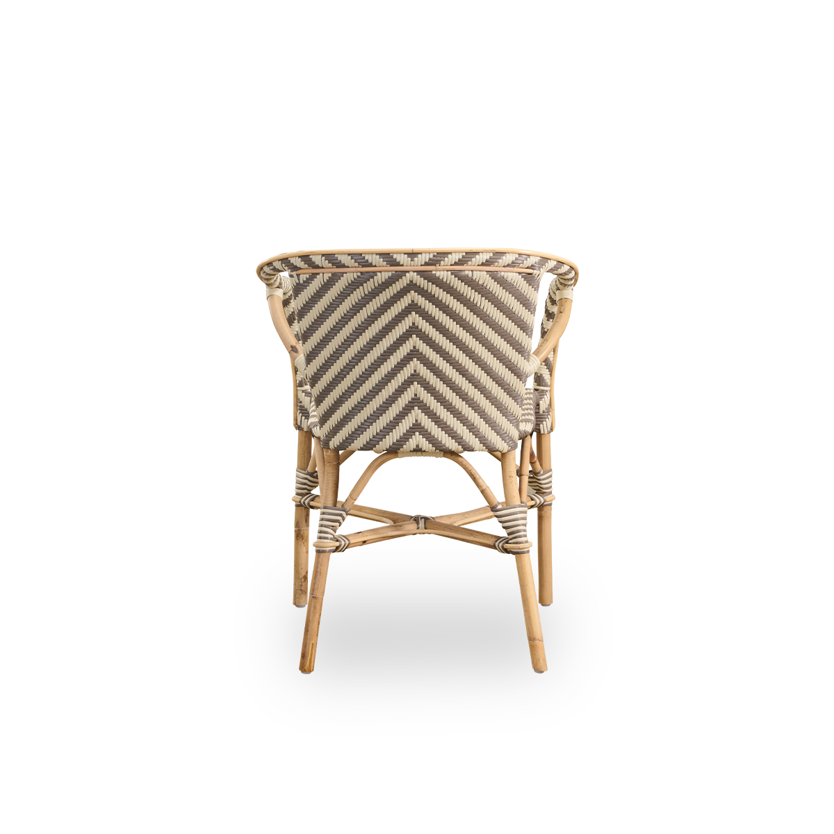 Plain back view of Madeleine dining armchair. Rattan frame with seat and backrest woven with ArtFibre in ivory and brown herringbone pattern. Inspired by 1950s bistro design.