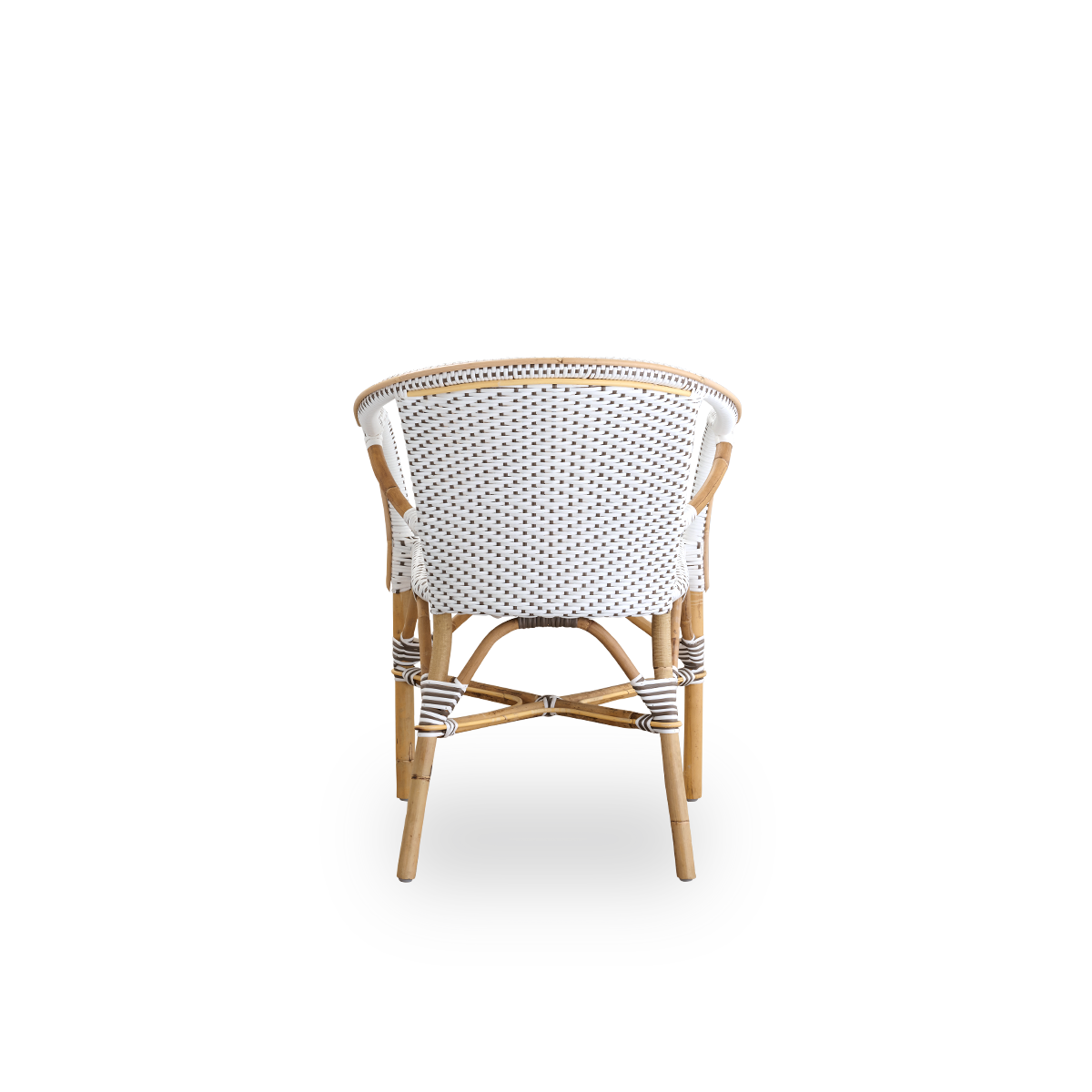 Plain back view of Madeleine dining armchair. Rattan frame with seat and backrest woven with ArtFibre in white with brown dots. Inspired by 1950s bistro design.