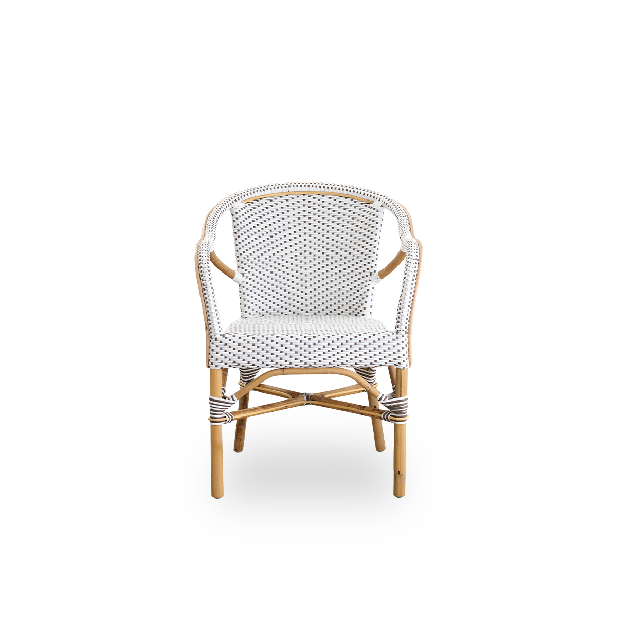 Front view of the Madeleine dining armchair.
Rattan frame with seat and backrest woven with ArtFibre in white with brown dots. Inspired by 1950s bistro design.