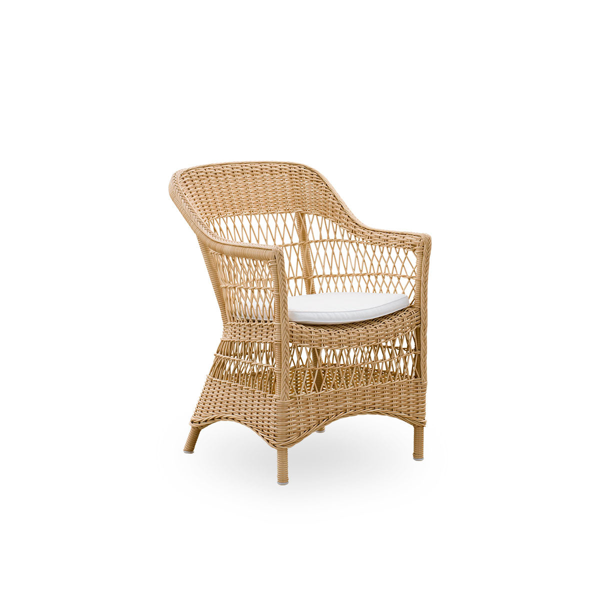 Side view of the Charlot Exterior dining chair in a natural color, a fully woven outdoor chair in British colonial style handcrafted from ArtFibre on durable aluminum frames.