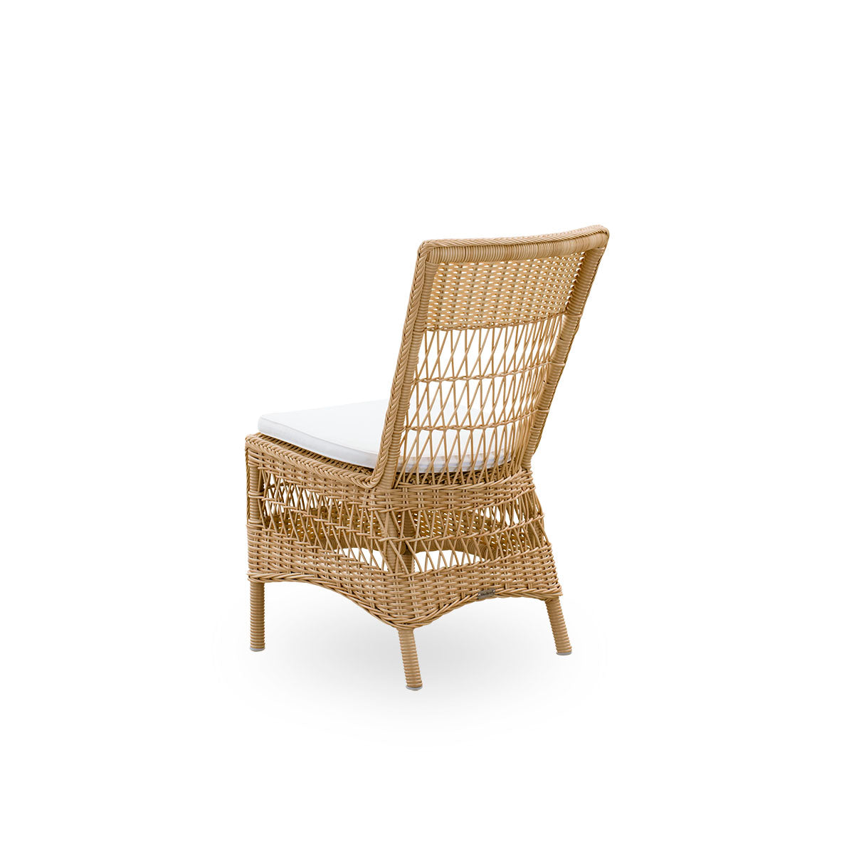 Plain back view of Marie outdoor dining chair presented in Natural color. Aluminum frame fully woven with ArtFibre inspired by British colonial style.