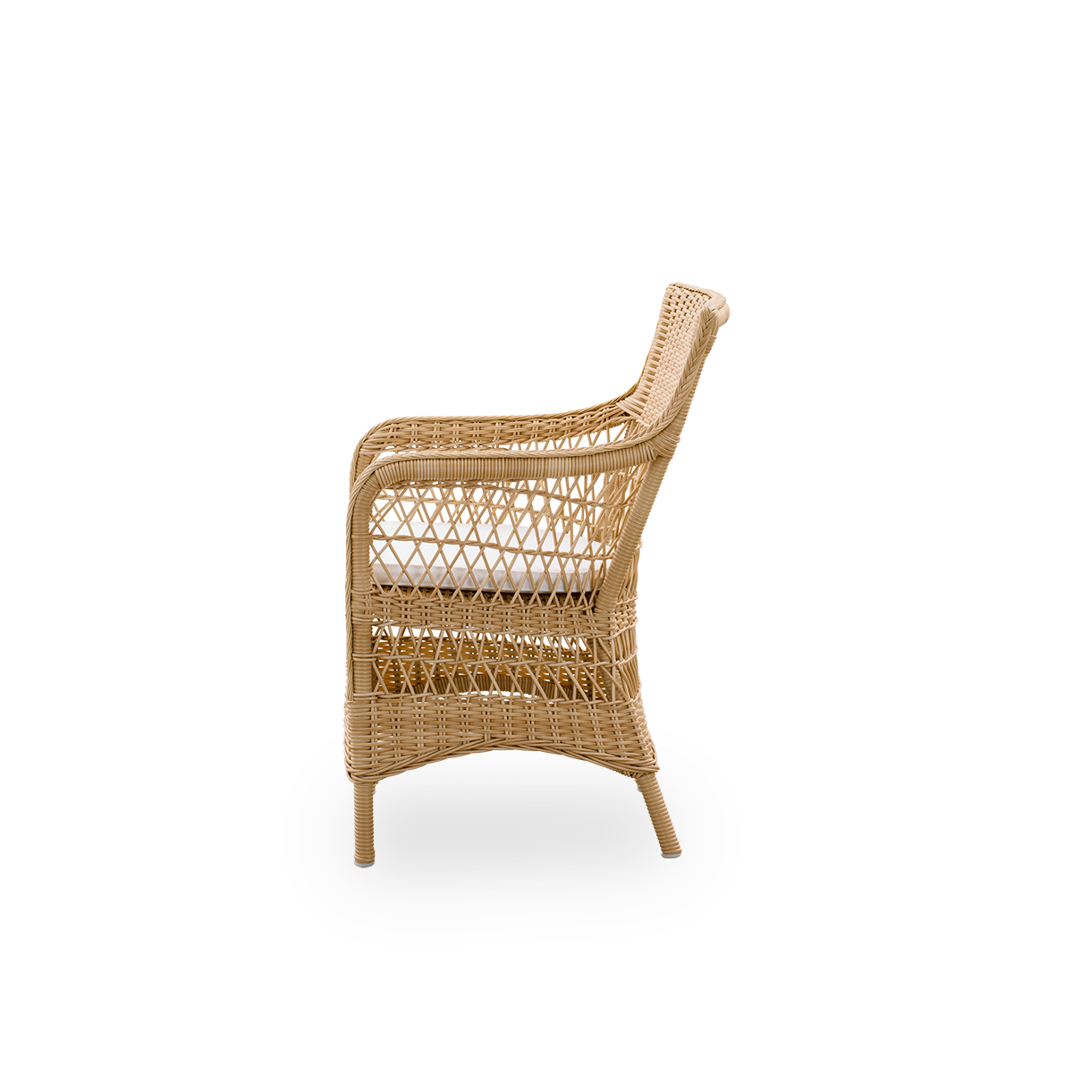 Plain side view of Marie outdoor dining chair with armrests presented in Natural color. Aluminum frame fully woven with ArtFibre inspired by British colonial style.
