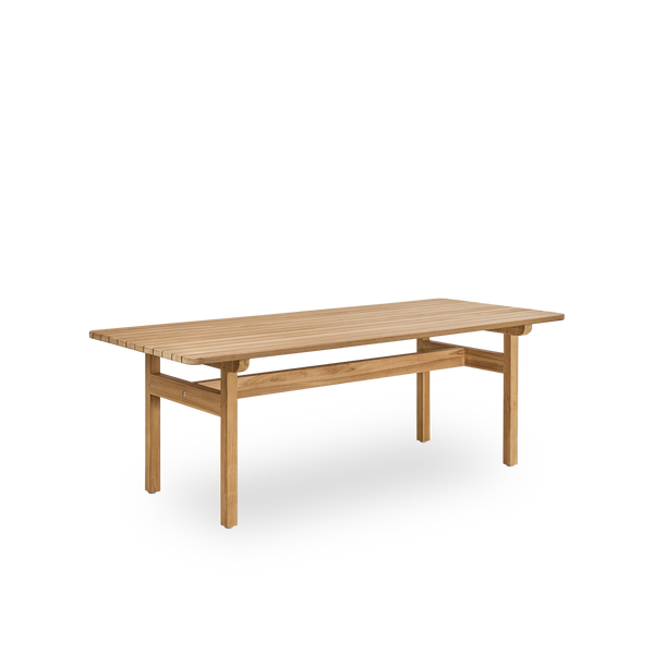 Side view of Tobias outdoor teak table designed by Arne Jacobsen, size 205x91 cm. Handcrafted in high quality certified Indonesian teak wood.