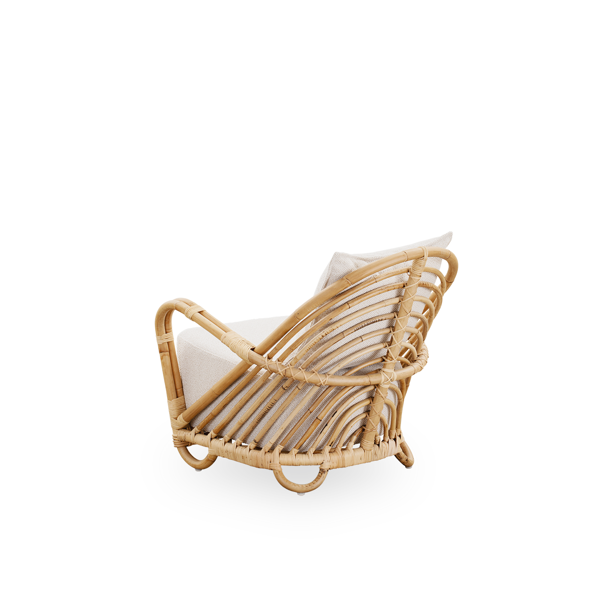 Plain back view of the Charlottenborg Lounge Chair in polished natural rattan, designed by Arne Jacobsen. The chair features a curved back and armrests integrated into the base, handcrafted from high quality Indonesian rattan.