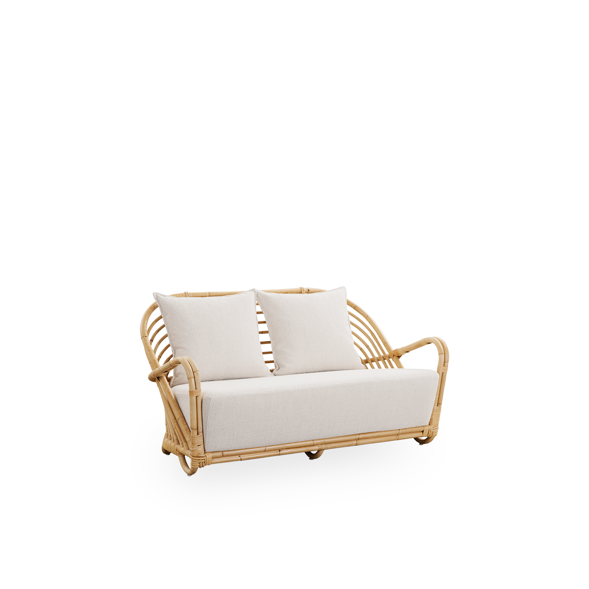 Side view of the Charlottenborg 2-seater Sofa in polished natural rattan, designed by Arne Jacobsen. The sofa features a curved back and armrests integrated into the base, handcrafted from high quality Indonesian rattan.