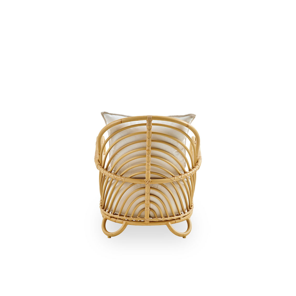Side view of the Charlottenborg Exterior lounge chair in rattan look, designed by Arne Jacobsen. The chair features a curved back and armrests integrated into the base, handcrafted with an Alu-Rattan frame and woven ArtFibre details.