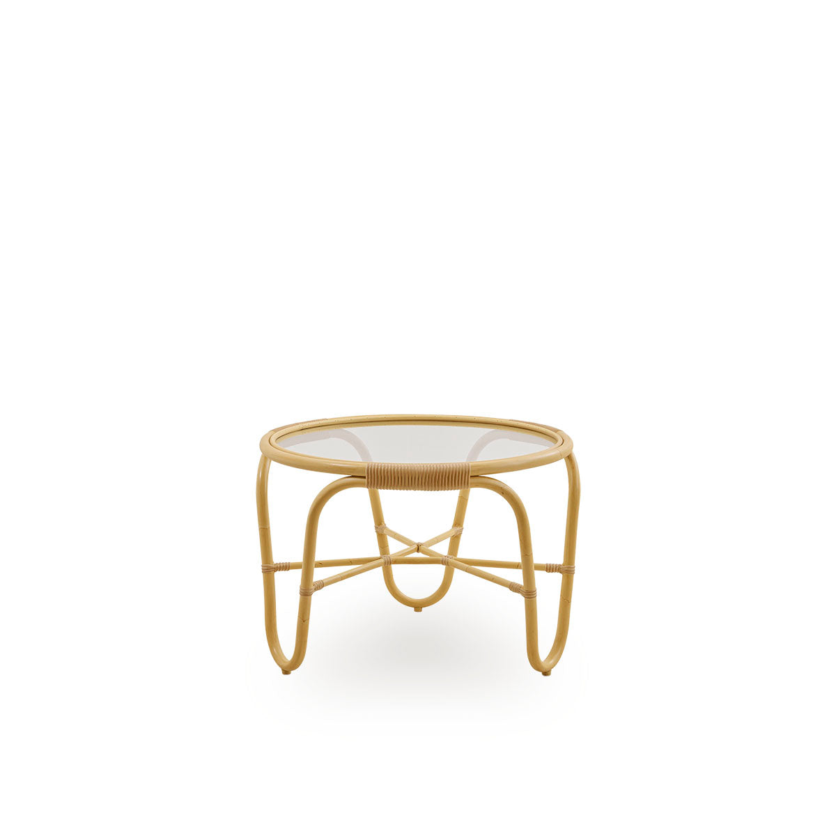 Side view of the The Charlottenborg coffee table in rattan look, designed by Arne Jacobsen, a round coffee table with integrated glass top, handcrafted with an Alu-Rattan frame and woven ArtFibre details.