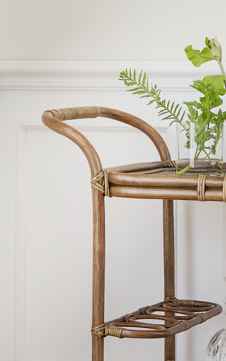 This is a close-up image of Carlo Trolley in antique Rattan.