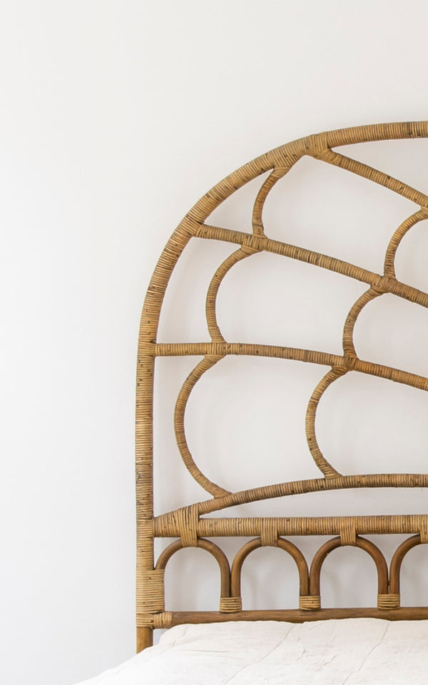 This is a close-up image of Celia Headboard in antique rattan.