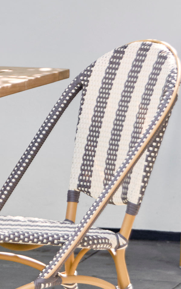 This is a close-up image of Sofie Exterior Dining Chair in almond aluminium frame striped cappuccino ivory artfibre.