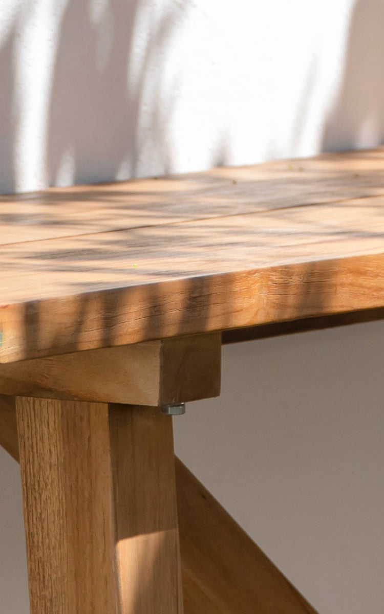 This is a close-up image of George Exterior Bench in outdoor Teak.