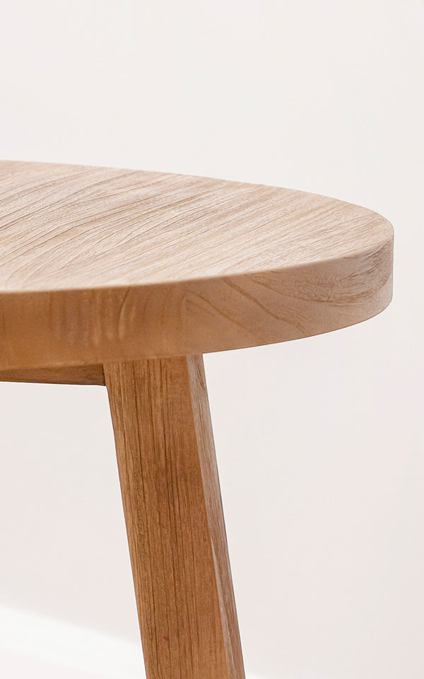 This is a close-up image of Aksel Coffee Table in teak indoor.