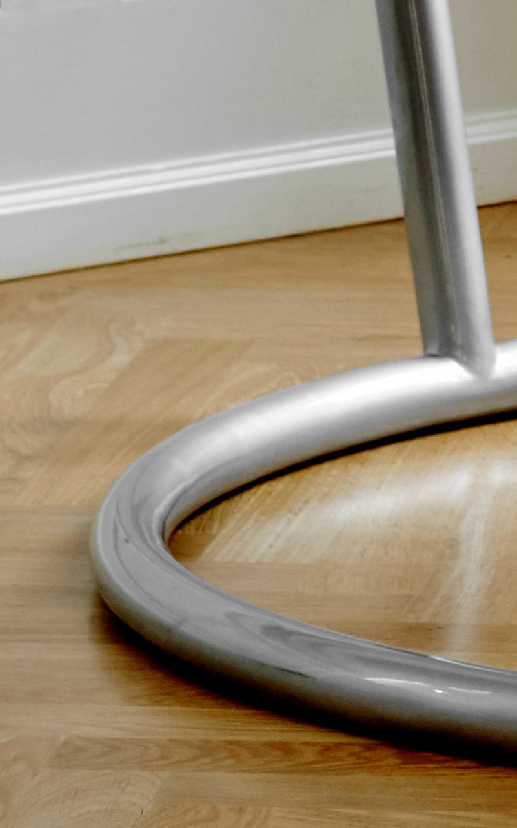 This is a close-up image of Stand Hanging Egg Chair in metal stand.