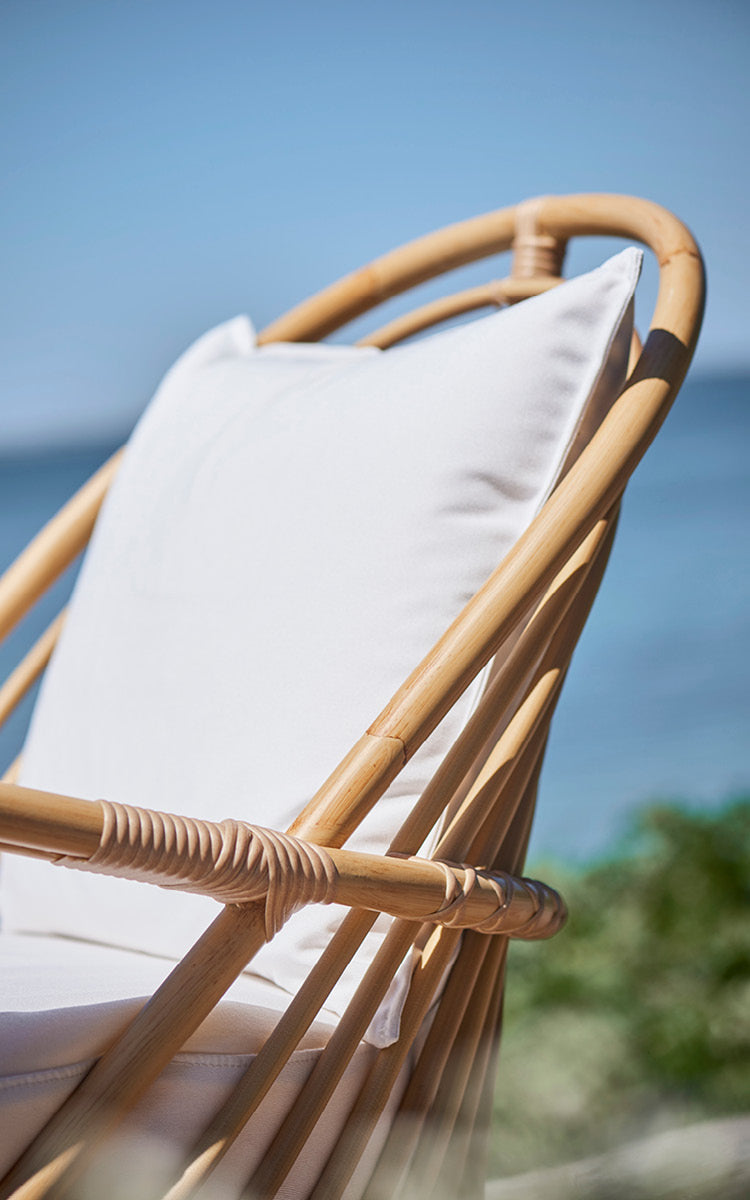 This is a close-up image of Charlottenborg Exterior Lounge Chair in natural Aluminium ArtFibre.