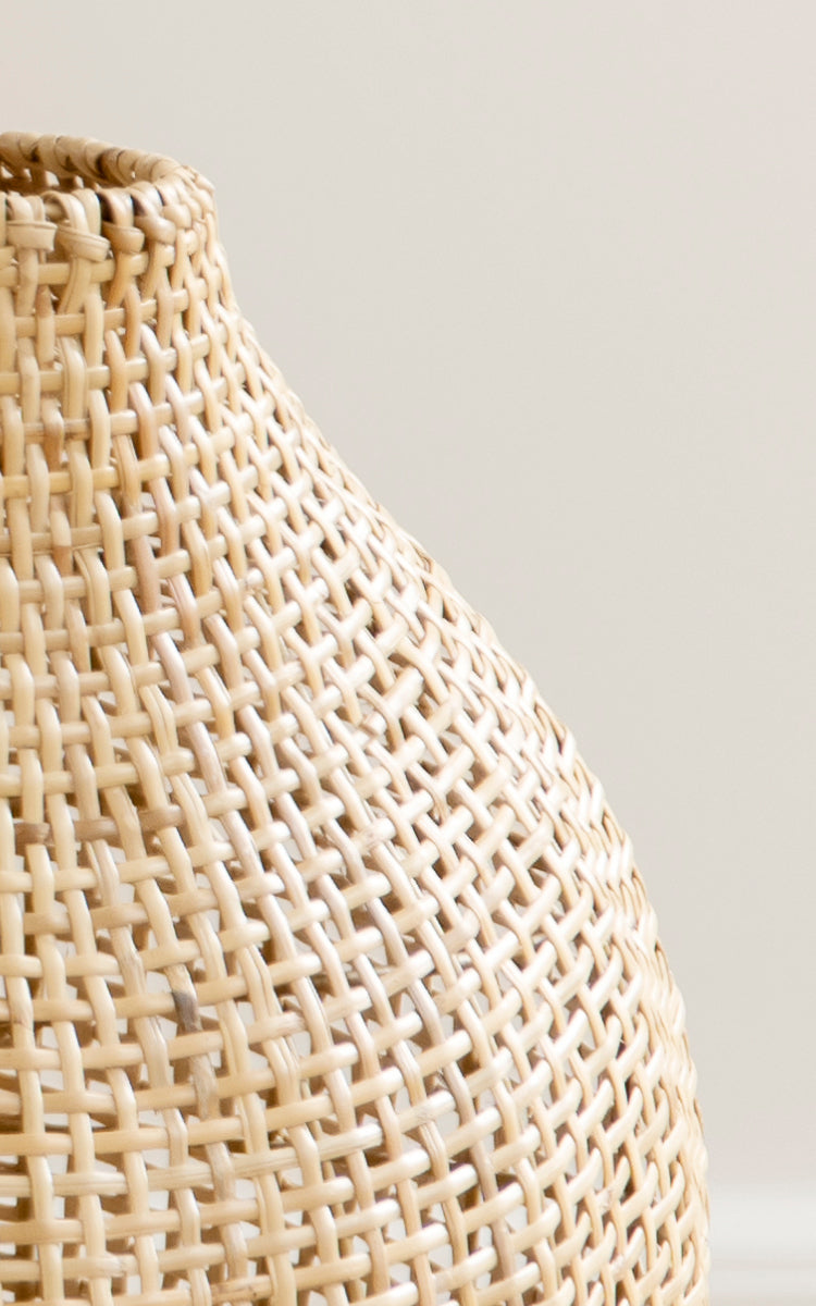 This is a close-up image of Figura Floor Lampshade in light natural weave rattan.