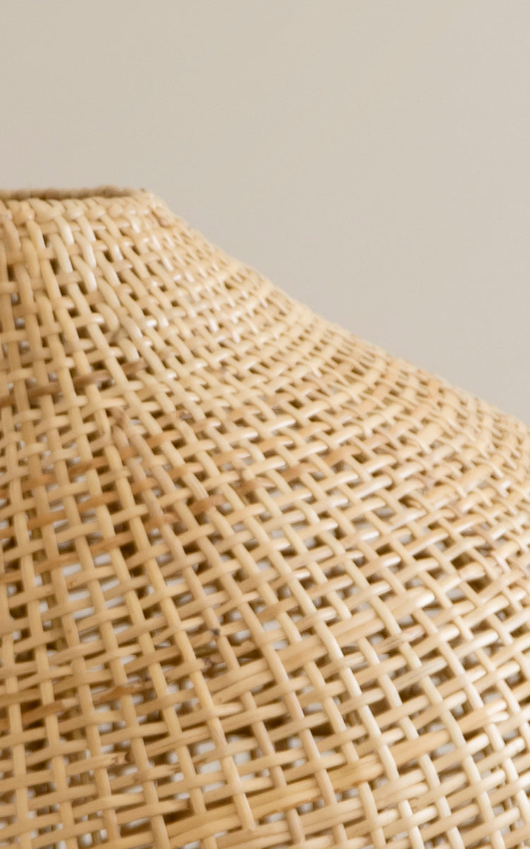 This is a close-up image of Figura Floor Lampshade in light natural weave rattan.