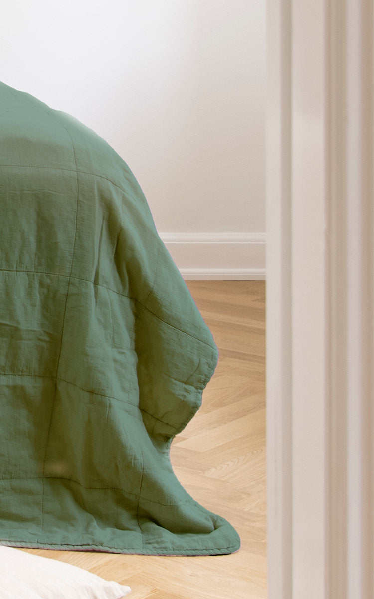 This is a close-up image of CTE058DF Bedspread in dark Forest Cotton.