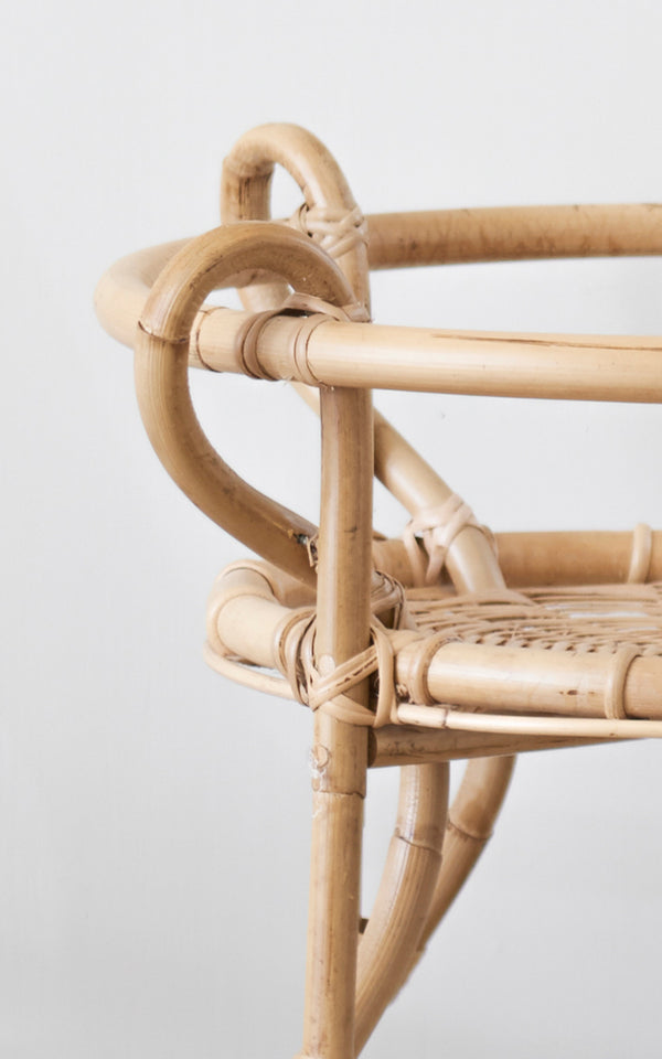 This is a close-up image of Fratellino Trolley in polished Natural Rattan.