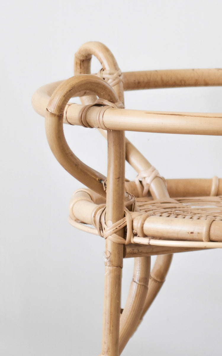 This is a close-up image of Fratellino Trolley in polished Natural Rattan.