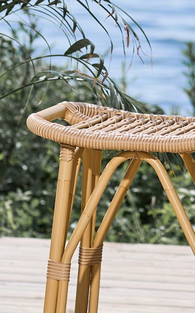 This is a close-up image of Salsa Exterior Counter Stool in natural aluminium artfibre.